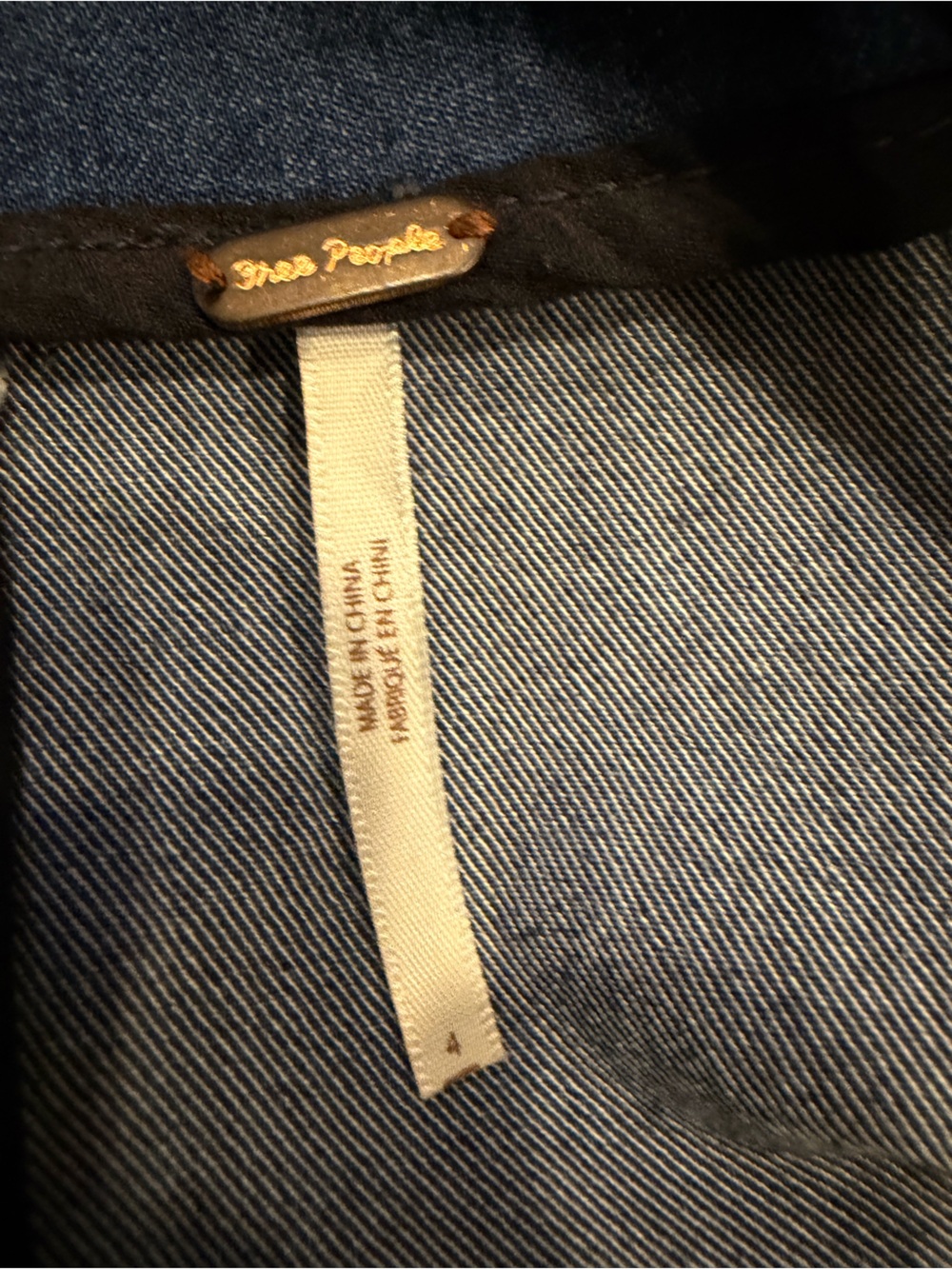 Free People denim blue jean jacket with gold hardware